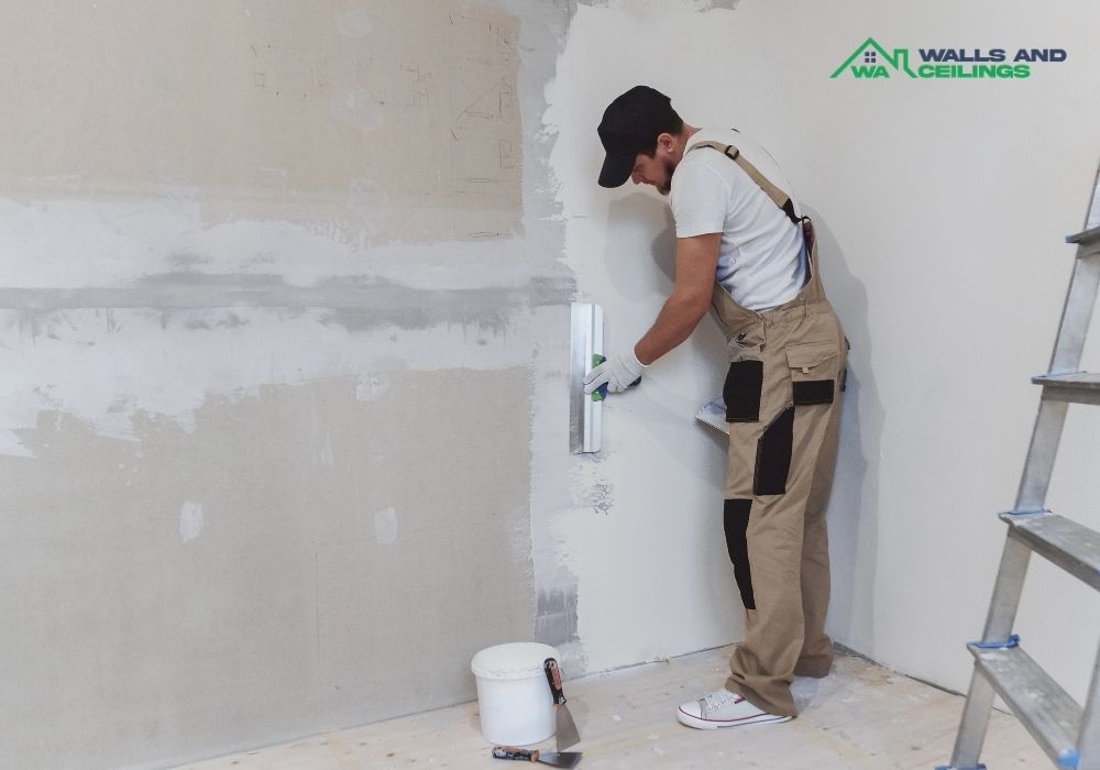 worker doing Wall renovation - WA Walls and Ceilings