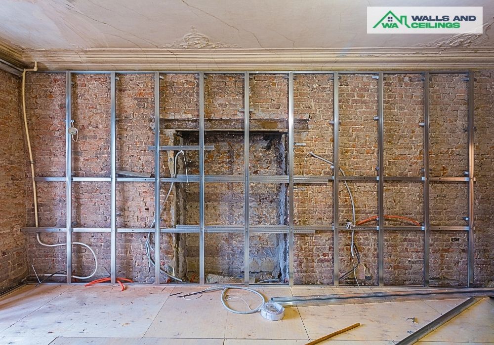 Brick wall with metal frames for internal wall cover up in Greenwood home