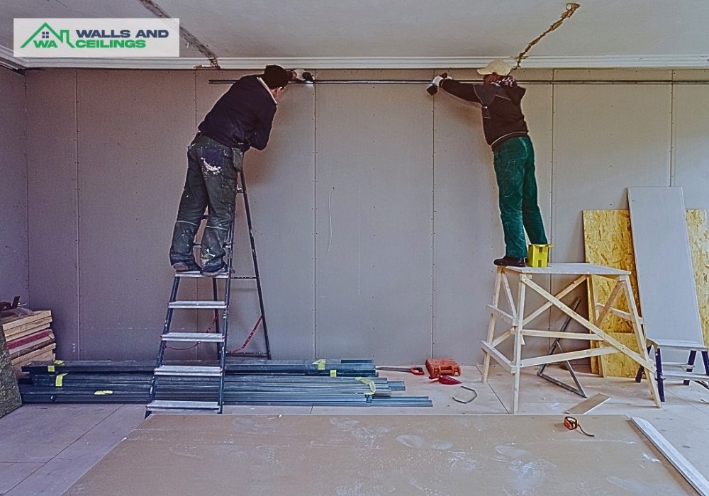 Workers installing Gyprock walls on brick walls in Karrinyup home